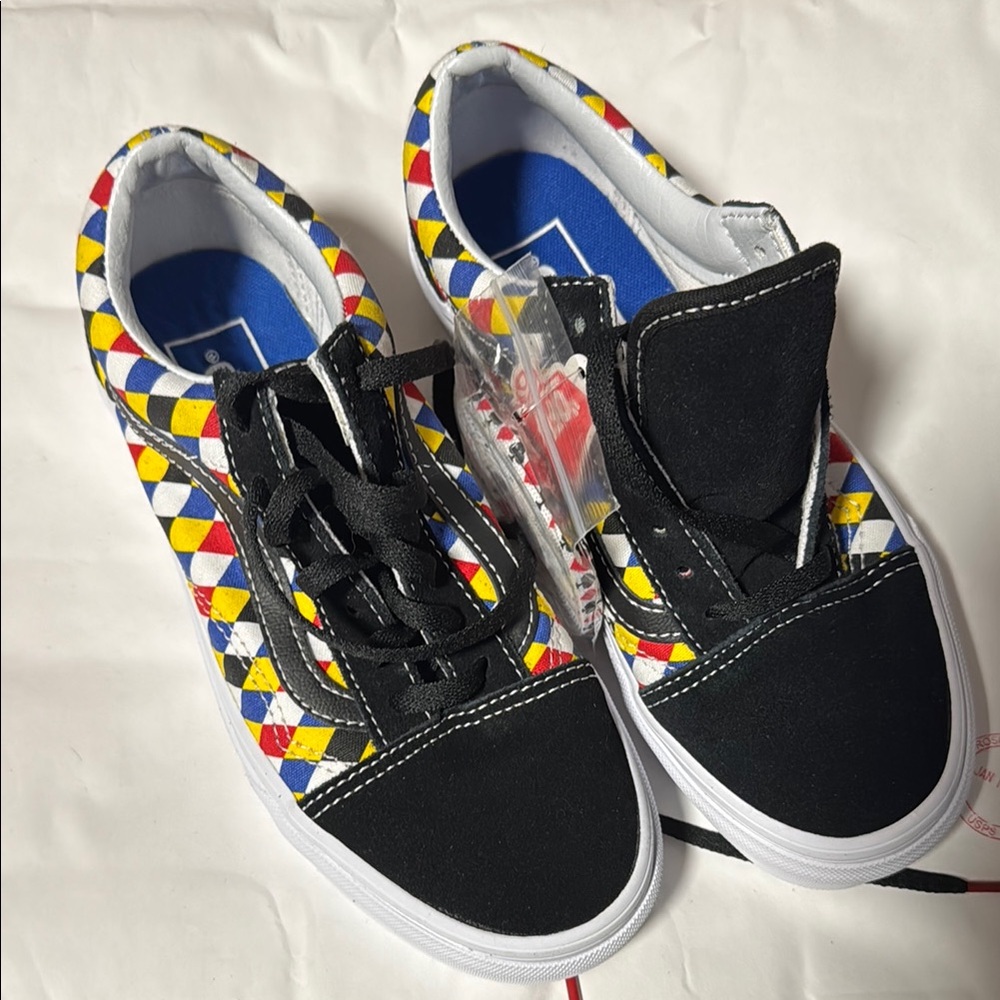 Vans Kids Sneakers in Black, Yellow, Red, and Blue